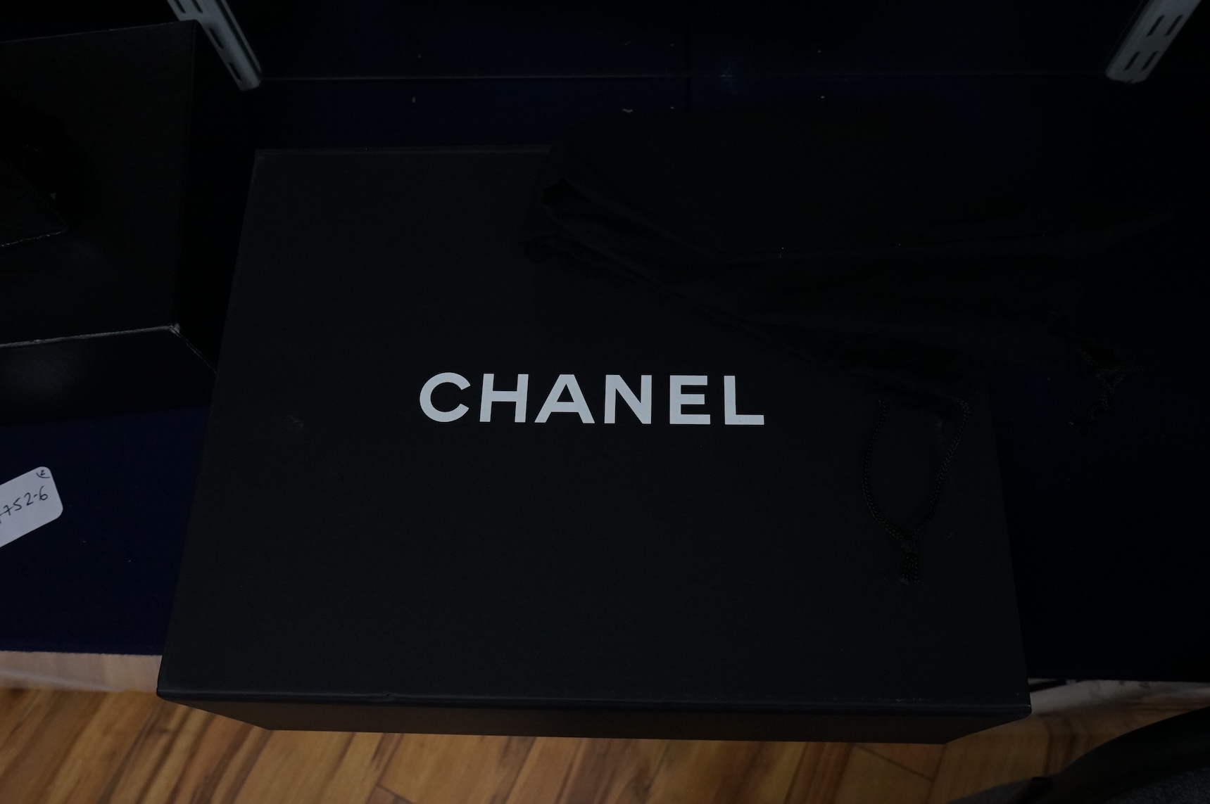 A Chanel East West dark red quilted leather flap shoulder bag with silver hardware, date code 12115484, with original receipt, dust cover and box, 35cm wide, Provenance: purchased by the vendor in Selfridges
